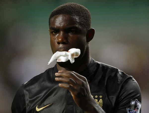 Manchester City&#8217;s Richards leaves the field after an injury during their soccer match against South China at the Barclays Asia Trophy friendly tournament in Hong Kong