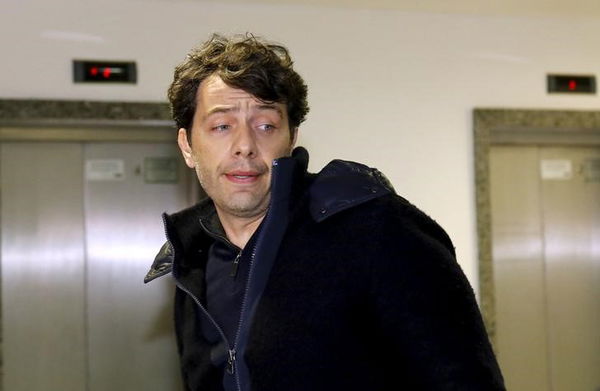 Andrade Gutierrez top executive Paulo Roberto Dalmazzo arrives at the Federal Police station in Curitiba