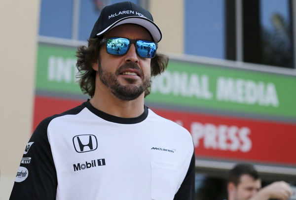 McLaren Formula One driver Fernando Alonso of Spain walks out after driver&#8217;s news conference at the Yas Marina circuit before the start of the Abu Dhabi Grand Prix