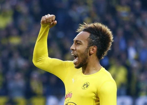 Borussia Dortmund&#8217;s Aubameyang celebrates after scoring a goal during their Bundesliga first division soccer match against Schalke 04 in Dortmund