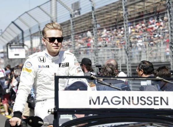 McLaren Formula One driver Kevin Magnussen of Denmark looks on during the drivers parade before the Australian F1 Grand Prix at the Albert Park circuit in Melbourne