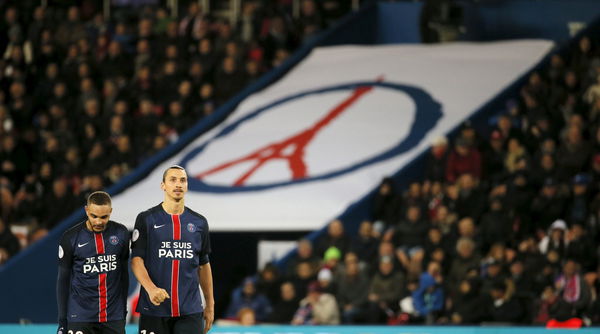 Paris St Germain&#8217;s Zlatan Ibrahimovic and Layvin Kurzawa wear shirts that read &#8220;Je suis Paris&#8221; (I am Paris), in tribute to the victims of the recent attacks in the French capital, during the French Ligue 1 soccer match between Paris St Germain and Troyes