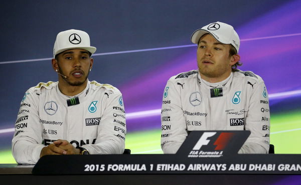 Mercedes Formula One driver Rosberg of Germany and Mercedes Formula One driver Hamilton of Britain speak at a news conference after the qualifying session of Abu Dhabi F1 Grand Prix at the Yas Marina circuit in Abu Dhabi