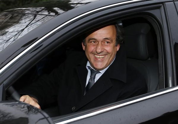 UEFA President Platini leaves after a hearing at the Court of Arbitration for Sport in Lausanne