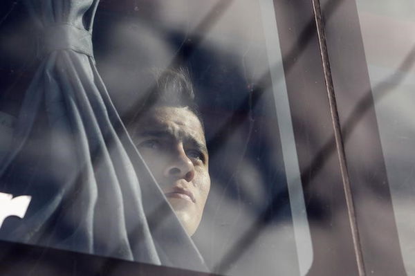 Argentina&#8217;s national soccer team player Marcos Rojo is seen in an official bus as the team arrives at the Argentine Football Association (AFA) in Buenos Aires