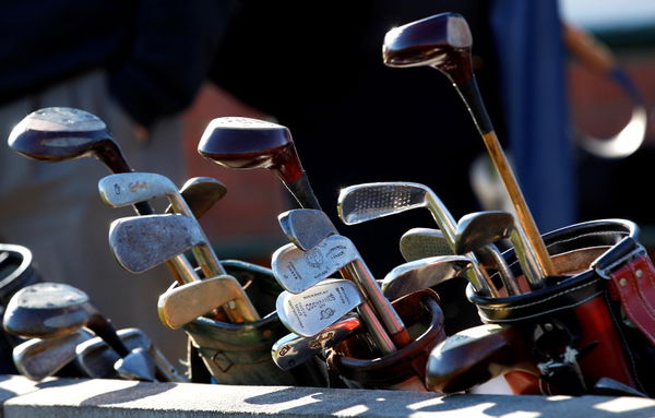 Sets of hickory golf clubs sit outside clubhouse during World Hickory Open Golf Championship at Monifeith Links golf course in Monifeith