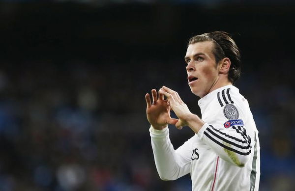 Real Madrid&#8217;s Bale celebrates scoring against Ludogorets during their Champions League Group B soccer match against Ludogorets at Santiago Bernabeu stadium in Madrid