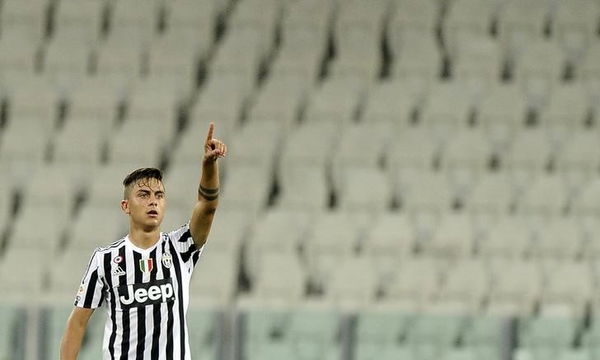 Juventus&#8217; Paulo Dybala celebrates after scoring against Chievo Verona during their Italian Serie A soccer match in Turin