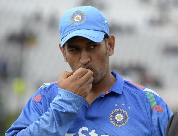 India&#8217;s Mahendra Singh Dhoni looks on before the coin toss before the third one-day international cricket match against England at Trent Bridge cricket ground, Nottingham