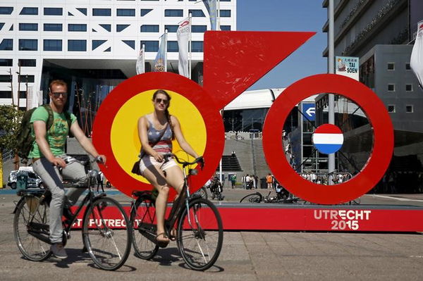 A giant Grand Depart logo of the Tour de France cycling race in Utrecht is seen in front of Utrecht Centraal train station