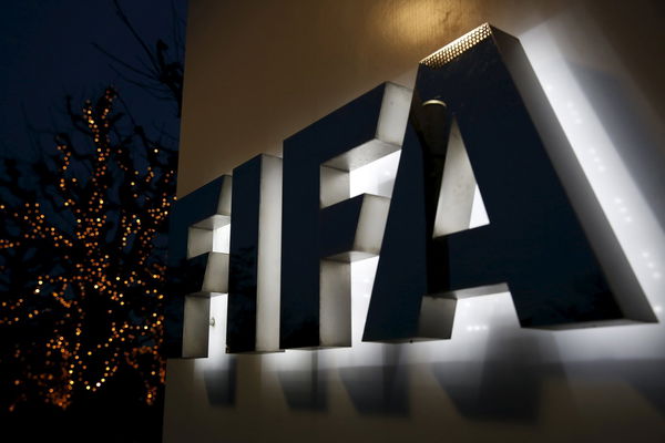 The FIFA logo is seen outside the FIFA headquarters in Zurich