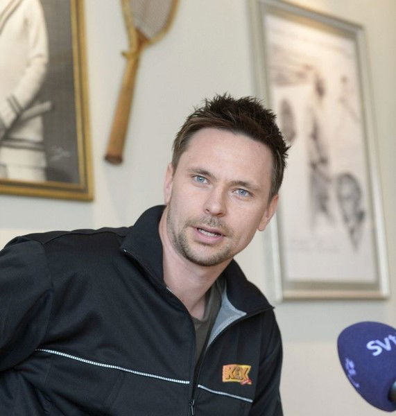 Robin Soderling smiles during a news conference at the Royal Tennis Hall in Stockholm