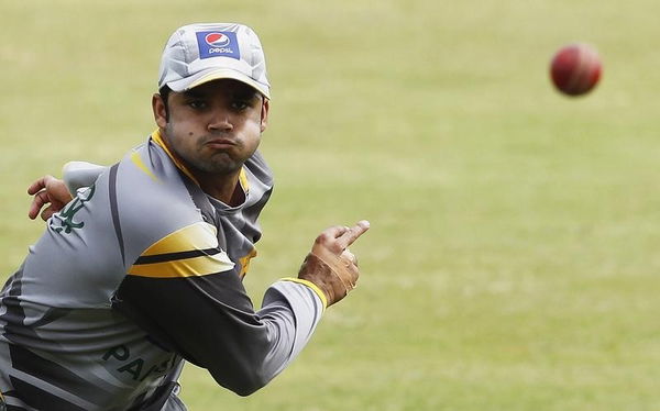 Pakistan&#8217;s Ali throws a ball during practice session ahead of their first test cricket match against Sri Lanka in Galle