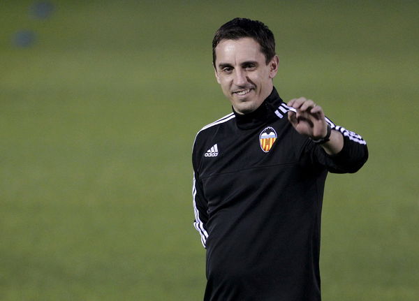 Valencia&#8217;s new coach Gary Neville greets the public during his first training session in Valencia