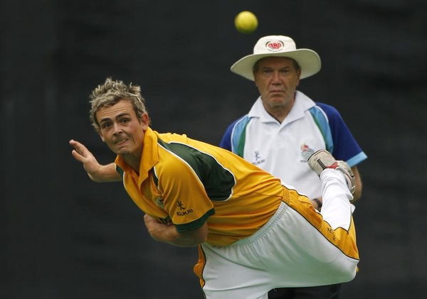 Australia&#8217;s Stephen O&#8217;Keefe bowls against compatriot Justin Langer of the All Stars, during their Hong Kong Cricket Sixes tournament