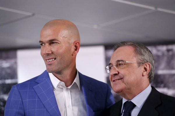 Real Madrid&#8217;s new coach Zidane and Real Madrid&#8217;s President Florentino Perez pose for the media at Santiago Bernabeu stadium in Madrid