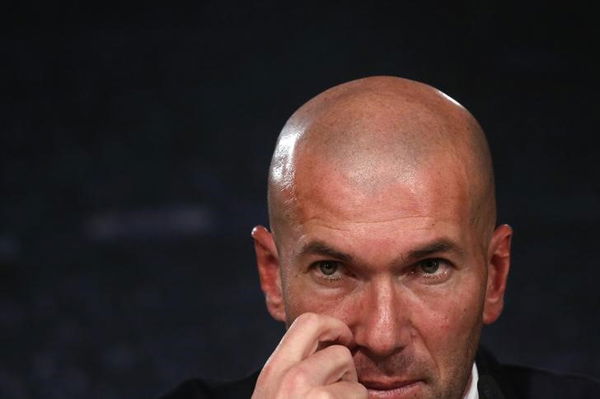 Real Madrid&#8217;s new coach Zinedine Zidane attends a news conference at Santiago Bernabeu stadium in Madrid