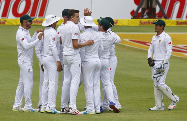 South Africa&#8217;s players celebrate the wicket of England&#8217;s Alex Hales during their second cricket test match in Cape Town, South Africa