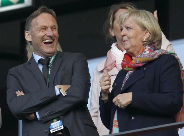 Watzke Borussia Dortmund President and Kraft NRW federal state Premier laugh during German Cup final soccer match against VfL Wolfsburg in Berlin