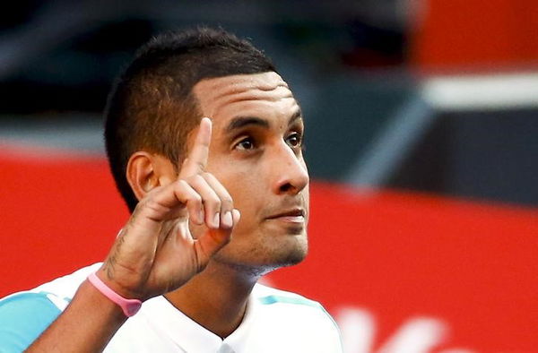 Nick Kyrgios of Australia gestures after defeating Roberto Bautista Agut of Spain  during their men&#8217;s singles tennis match at the Japan Open championships in Tokyo