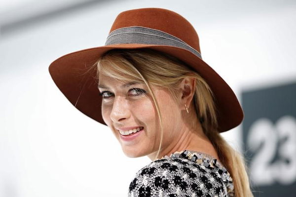 Russia&#8217;s tennis player Maria Sharapova poses before the Spring/Summer 2016 women&#8217;s ready-to-wear collection for fashion house Chanel in Paris