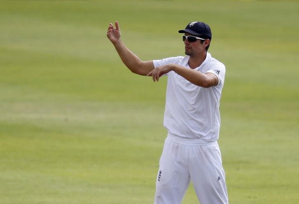 England&#8217;s Cook adjusts the field during the second cricket test match against South Africa in Cape Town