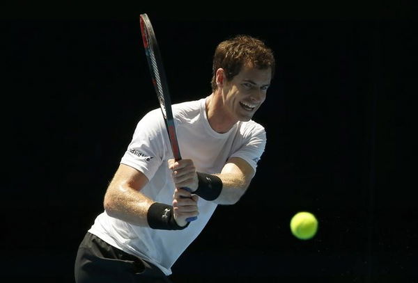 Britain&#8217;s Andy Murray hits a shot during a practice session at Melbourne Park, Australia