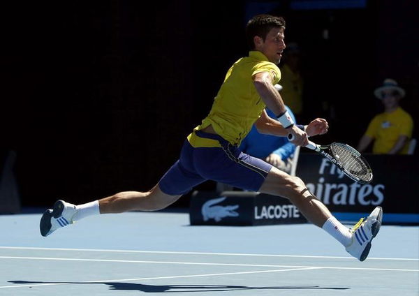 Serbia&#8217;s Djokovic runs and jumps to hit a shot during his first round match against South Korea&#8217;s Chung at the Australian Open tennis tournament at Melbourne Park, Australia