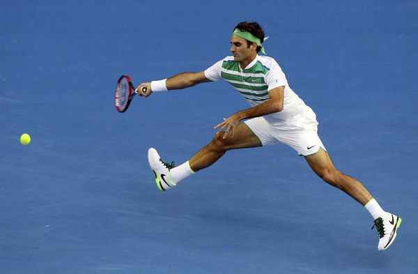 Switzerland&#8217;s Federer stretches to hit a shot during his first round match against Georgia&#8217;s Basilashvili at the Australian Open tennis tournament at Melbourne Park, Australia