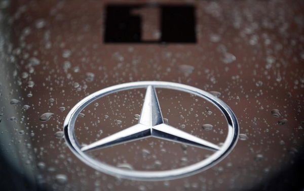 Rain drops fall on a Mercedes logo on the body of a McLaren Formula One car at the pit box during the first practice session of the Turkish F1 Grand Prix  in Istanbul