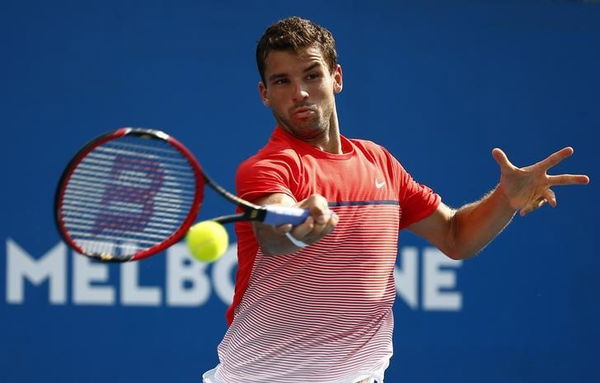 Bulgaria&#8217;s Dimitrov hits a shot during his second round match against Argentina&#8217;s Trungelliti at the Australian Open tennis tournament at Melbourne Park