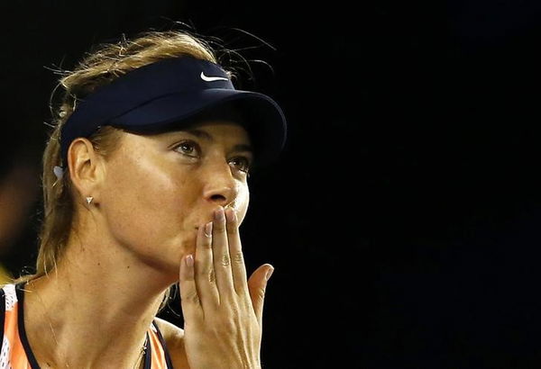 Russia&#8217;s Sharapova celebrates after winning her third round match against Davis of the U.S. at the Australian Open tennis tournament at Melbourne Park