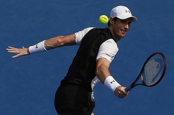 Britain&#8217;s Murray hits a shot during his second round match against Australia&#8217;s Groth at the Australian Open tennis tournament at Melbourne Park