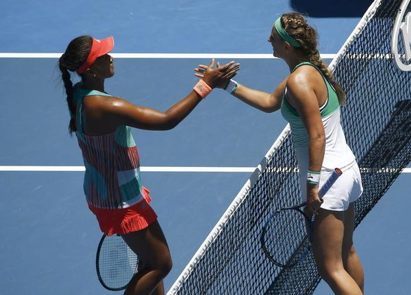 Belarus&#8217; Azarenka shakes hands with Japan&#8217;s Osaka after Azarenka won their third round match at the Australian Open tennis tournament at Melbourne Park