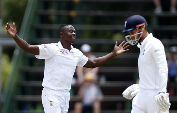 South Africa&#8217;s Kagiso Rabada (L) celebrates the dismissal of England&#8217;s Alex Hales after he was caught out by AB de Villiers during the third cricket test match in Johannesburg,