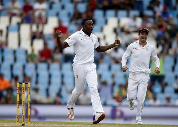 South Africa&#8217;s Kagiso Rabada celebrates with his captain AB de Villiers, the dismissal of England&#8217;s Jonny Bairstow who was caught out by wicket keeper Quinton de Kock during the fourth cricket test match in Centurion