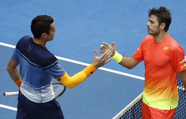 Canada&#8217;s Raonic and Switzerland&#8217;s Wawrinka shake hands at the net after Raonic won their fourth round match at the Australian Open tennis tournament at Melbourne Park