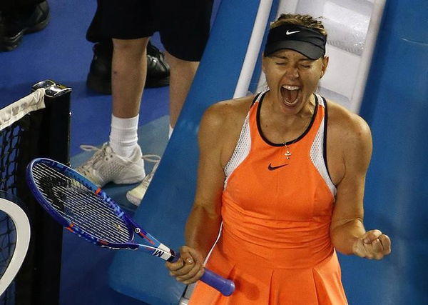 Russia&#8217;s Sharapova celebrates after winning her fourth round match against Switzerland&#8217;s Bencic at the Australian Open tennis tournament at Melbourne Park