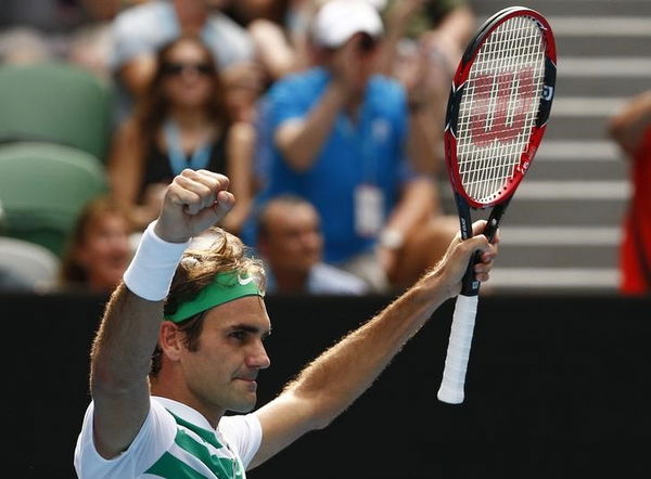 Switzerland&#8217;s Federer celebrates after winning his quarter-final match against Czech Republic&#8217;s Berdych at the Australian Open tennis tournament at Melbourne Park