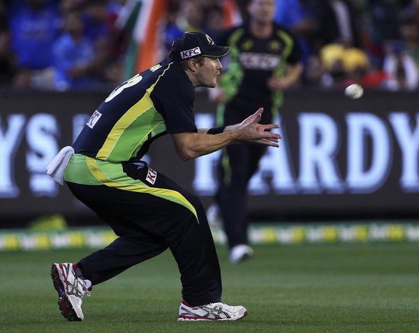 Australia&#8217;s Shane Watson takes a catch to dismiss India&#8217;s Mahendra Singh Dhoni during their T20 cricket match at the Melbourne Cricket Ground