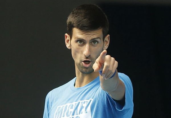 Serbia&#8217;s Djokovic gestures during a practice session on the eve of his final match against Britain&#8217;s Murray, at the Australian Open tennis tournament at Melbourne Park