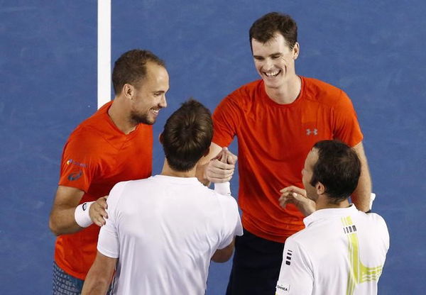 Britain&#8217;s Murray and Canada&#8217;s Nestor shake hands after their doubles final match at the Australian Open tennis tournament at Melbourne Park