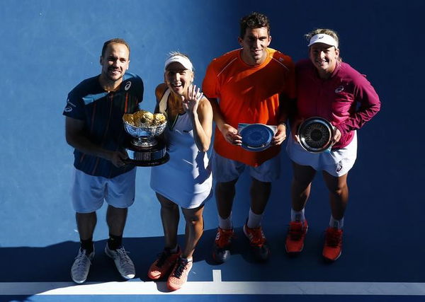 Brazil&#8217;s Soares and Russia&#8217;s Vesnina pose with the mixed doubles trophy beside Romania&#8217;s Tecau and Vandeweghe of the U.S. after their mixed doubles final match at the Australian Open tennis tournament at Melbourne Park