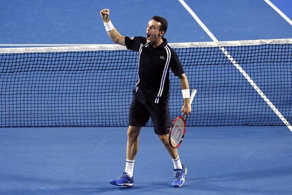 Spain&#8217;s Bautista Agut celebrates after winning his third round match against Croatia&#8217;s Cilic at the Australian Open tennis tournament at Melbourne Park