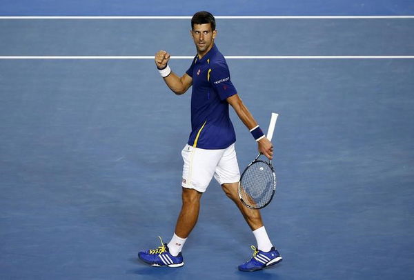 Serbia&#8217;s Djokovic celebrates after winning his quarter-final match against Japan&#8217;s Nishikori at the Australian Open tennis tournament at Melbourne Park