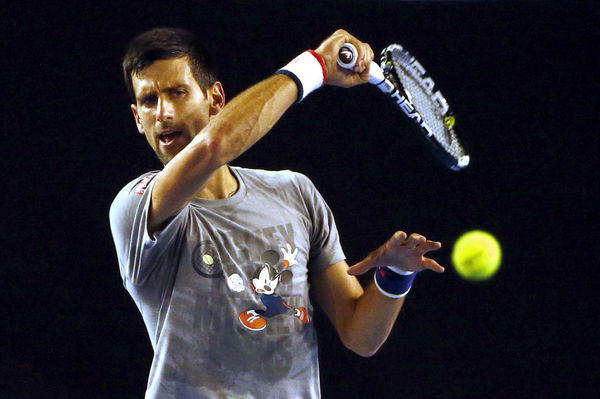 Serbia&#8217;s Djokovic hits shot during a practice session at Melbourne Park, Australia