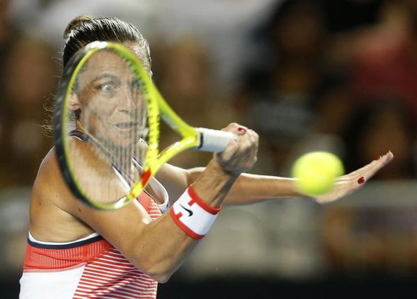 Italy&#8217;s Vinci hits a shot during her third round match against Germany&#8217;s Friedsam at the Australian Open tennis tournament at Melbourne Park