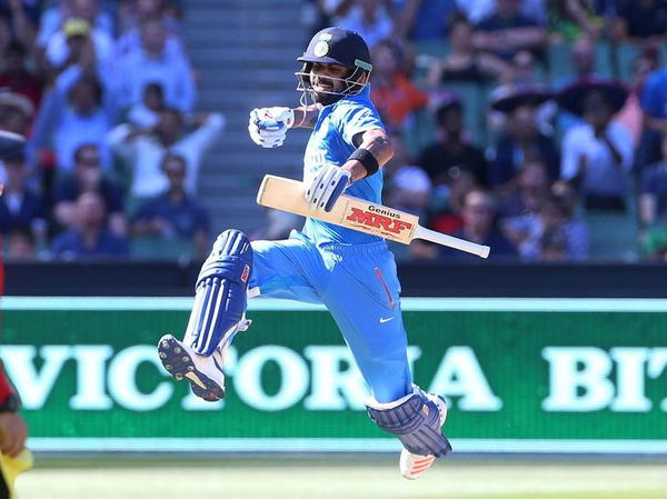 India&#8217;s Virat Kohli celebrates his century against Australia during their One Day cricket match at the Melbourne Cricket Ground