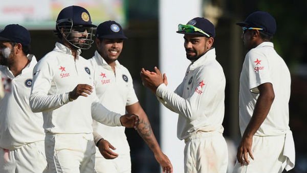 Indian-cricket-team-captain-Virat-Kohli-2R-and-teammates-celebrate-after-dismissing-Sri-Lankan-cricketer-Kaushal-Silva1111 (1)