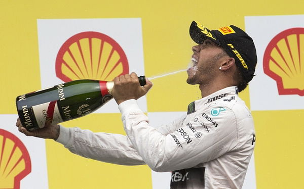 Mercedes Formula One driver Lewis Hamilton of Britain  celebrates his victory in the Belgian F1 Grand Prix in Spa-Francorchamps